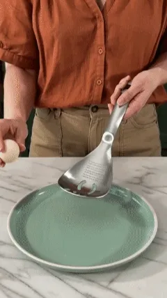5-in-1 stainless steel kitchen spoon in use
